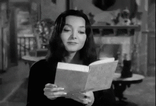 morticia-book.gif